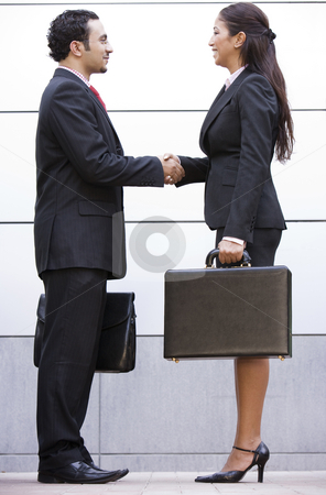 To use this stock image in your creative project, please select the size you need over to the right and click the "Add to Cart" button.
Your downloaded image will come with the Cutcaster watermark removed so don’t worry about the watermark you see on this page. Business meeting outside office stock photo, Business meeting outside modern office by Monkey Business Images
