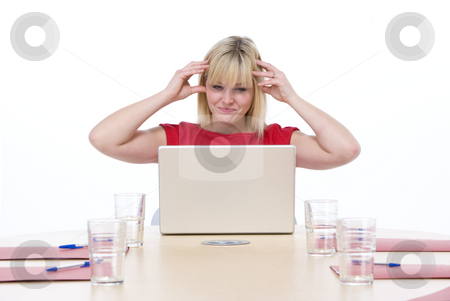 To use this stock image in your creative project, please select the size you need over to the right and click the "Add to Cart" button.
Your downloaded image will come with the Cutcaster watermark removed so don’t worry about the watermark you see on this page. Businesswoman sitting in boardroom with laptop looking frustrate stock photo, by Monkey Business Images