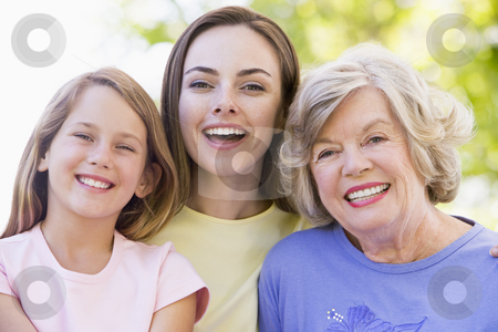 To use this stock image in your creative project, please select the size you need over to the right and click the "Add to Cart" button.
Your downloaded image will come with the Cutcaster watermark removed so don’t worry about the watermark you see on this page. Grandmother with adult daughter and grandchild in park stock photo, by Monkey Business Images
