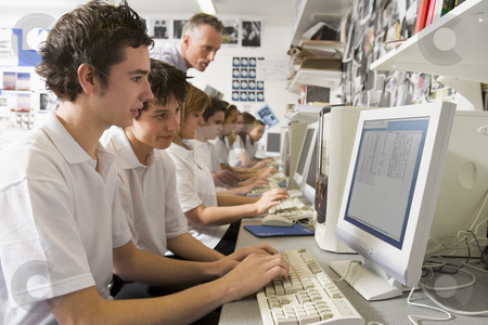 To use this stock image in your creative project, please select the size you need over to the right and click the "Add to Cart" button.
Your downloaded image will come with the Cutcaster watermark removed so don’t worry about the watermark you see on this page. Row of schoolchildren studying in front of a computer stock photo, by Monkey Business Images