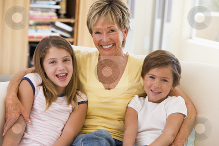 To use this stock image in your creative project, please select the size you need over to the right and click the "Add to Cart" button.
Your downloaded image will come with the Cutcaster watermark removed so don’t worry about the watermark you see on this page. Grandmother posing with grandchildren stock photo, by Monkey Business Images