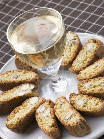 To use this stock image in your creative project, please select the size you need over to the right and click the "Add to Cart" button.
Your downloaded image will come with the Cutcaster watermark removed so don’t worry about the watermark you see on this page. Hazelnut Cantuccini Biscotti with Dessert Wine stock photo, by Monkey Business Images