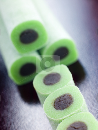 To use this stock image in your creative project, please select the size you need over to the right and click the "Add to Cart" button.
Your downloaded image will come with the Cutcaster watermark removed so don’t worry about the watermark you see on this page. Whole and Sliced Jade Rolls stock photo, Close up of Whole and Sliced Jade Rolls by Monkey Business Images