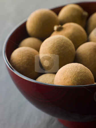To use this stock image in your creative project, please select the size you need over to the right and click the "Add to Cart" button.
Your downloaded image will come with the Cutcaster watermark removed so don’t worry about the watermark you see on this page. Longan in Wooden Bowl stock photo, Close up of Longan in Wooden Bowl by Monkey Business Images