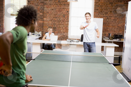 To use this stock image in your creative project, please select the size you need over to the right and click the "Add to Cart" button.
Your downloaded image will come with the Cutcaster watermark removed so don’t worry about the watermark you see on this page. Two men in office space playing ping pong stock photo, by Monkey Business Images