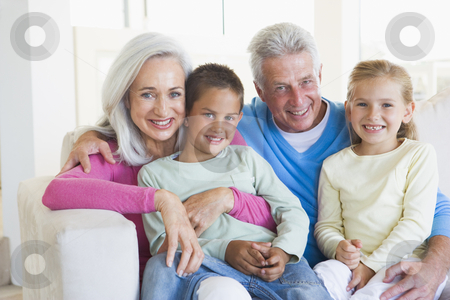 To use this stock image in your creative project, please select the size you need over to the right and click the "Add to Cart" button.
Your downloaded image will come with the Cutcaster watermark removed so don’t worry about the watermark you see on this page. Grandparents posing with grandchildren stock photo, by Monkey Business Images
