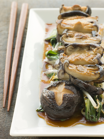 To use this stock image in your creative project, please select the size you need over to the right and click the "Add to Cart" button.
Your downloaded image will come with the Cutcaster watermark removed so don’t worry about the watermark you see on this page. Fried Shitake Mushrooms with Shoyu Pac Choi and Bean sprouts stock photo, Plate of Fried Shitake Mushrooms with Shoyu Pac Choi and Bean sprouts and chopsticks by Monkey Business Images