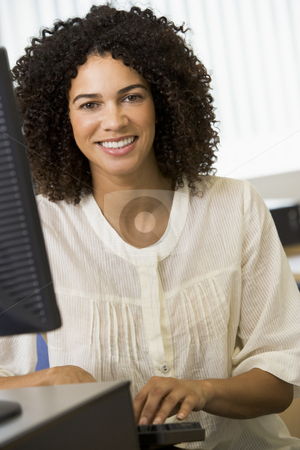 To use this stock image in your creative project, please select the size you need over to the right and click the "Add to Cart" button.
Your downloaded image will come with the Cutcaster watermark removed so don’t worry about the watermark you see on this page. Mid adult woman working on a computer stock photo, by Monkey Business Images