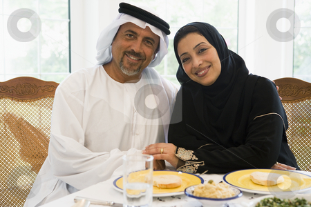 To use this stock image in your creative project, please select the size you need over to the right and click the "Add to Cart" button.
Your downloaded image will come with the Cutcaster watermark removed so don’t worry about the watermark you see on this page. A Middle Eastern couple enjoying a meal stock photo, by Monkey Business Images