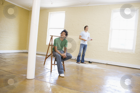To use this stock image in your creative project, please select the size you need over to the right and click the "Add to Cart" button.
Your downloaded image will come with the Cutcaster watermark removed so don’t worry about the watermark you see on this page. Two men with ladder in empty space holding paper and thinking stock photo, by Monkey Business Images