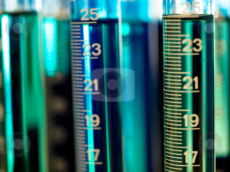 To use this stock image in your creative project, please select the size you need over to the right and click the "Add to Cart" button.
Your downloaded image will come with the Cutcaster watermark removed so don’t worry about the watermark you see on this page. Graduated cylinders stock photo, Graduated cylinders in a laboratory filled with blue dye by Laurent Dambies