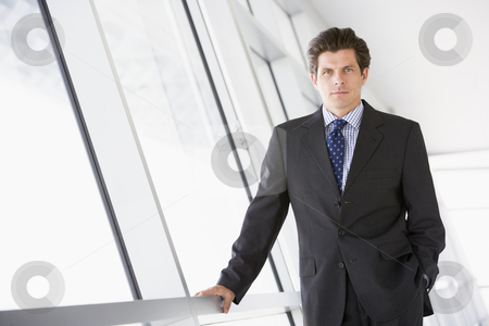 To use this stock image in your creative project, please select the size you need over to the right and click the "Add to Cart" button.
Your downloaded image will come with the Cutcaster watermark removed so don’t worry about the watermark you see on this page. Businessman standing in corridor stock photo, by Monkey Business Images