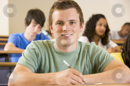 To use this stock image in your creative project, please select the size you need over to the right and click the "Add to Cart" button.
Your downloaded image will come with the Cutcaster watermark removed so don’t worry about the watermark you see on this page. Male college student in a university lecture hall stock photo, by Monkey Business Images