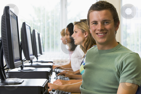 To use this stock image in your creative project, please select the size you need over to the right and click the "Add to Cart" button.
Your downloaded image will come with the Cutcaster watermark removed so don’t worry about the watermark you see on this page. College students in a computer lab stock photo, by Monkey Business Images