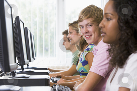 To use this stock image in your creative project, please select the size you need over to the right and click the "Add to Cart" button.
Your downloaded image will come with the Cutcaster watermark removed so don’t worry about the watermark you see on this page. College students in a computer lab stock photo, by Monkey Business Images