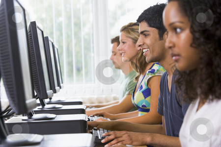 To use this stock image in your creative project, please select the size you need over to the right and click the "Add to Cart" button.
Your downloaded image will come with the Cutcaster watermark removed so don’t worry about the watermark you see on this page. College students in a computer lab stock photo, by Monkey Business Images