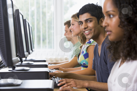To use this stock image in your creative project, please select the size you need over to the right and click the "Add to Cart" button.
Your downloaded image will come with the Cutcaster watermark removed so don’t worry about the watermark you see on this page. College students in a computer lab stock photo, by Monkey Business Images