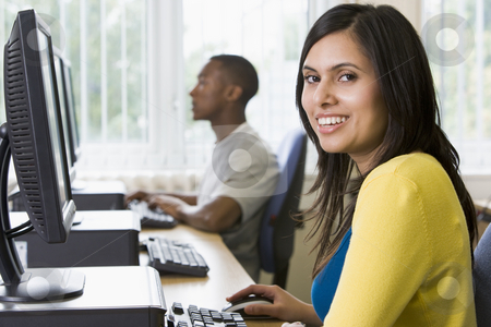 To use this stock image in your creative project, please select the size you need over to the right and click the "Add to Cart" button.
Your downloaded image will come with the Cutcaster watermark removed so don’t worry about the watermark you see on this page. College students in a computer lab stock photo, by Monkey Business Images