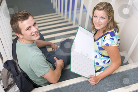 To use this stock image in your creative project, please select the size you need over to the right and click the "Add to Cart" button.
Your downloaded image will come with the Cutcaster watermark removed so don’t worry about the watermark you see on this page. Male and female college students sitting on stairs stock photo, by Monkey Business Images