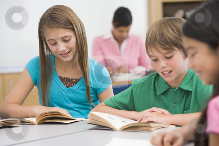 To use this stock image in your creative project, please select the size you need over to the right and click the "Add to Cart" button.
Your downloaded image will come with the Cutcaster watermark removed so don’t worry about the watermark you see on this page. Group of elementary school pupils reading stock photo, Group of elementary school pupils reading books by Monkey Business Images
