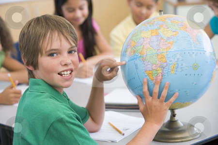 To use this stock image in your creative project, please select the size you need over to the right and click the "Add to Cart" button.
Your downloaded image will come with the Cutcaster watermark removed so don’t worry about the watermark you see on this page. Elementary school pupil with globe stock photo, Elementary school pupil in geography lesson by Monkey Business Images