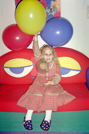 To use this stock image in your creative project, please select the size you need over to the right and click the "Add to Cart" button.
Your downloaded image will come with the Cutcaster watermark removed so don’t worry about the watermark you see on this page. Girl with ballons stock photo, 6 years old girl with ballons by Lothar Hinz