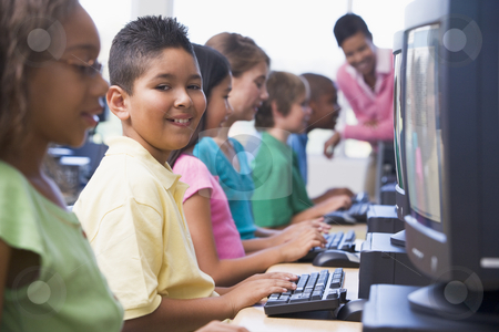 To use this stock image in your creative project, please select the size you need over to the right and click the "Add to Cart" button.
Your downloaded image will come with the Cutcaster watermark removed so don’t worry about the watermark you see on this page. Elementary school computer class stock photo, Male pupil in elementary school computer class by Monkey Business Images
