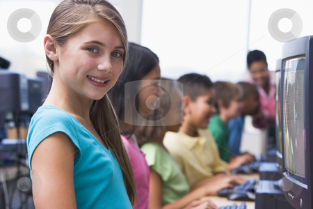 To use this stock image in your creative project, please select the size you need over to the right and click the "Add to Cart" button.
Your downloaded image will come with the Cutcaster watermark removed so don’t worry about the watermark you see on this page. Elementary school computer class stock photo, Female pupil in elementary school computer class by Monkey Business Images