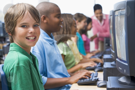 To use this stock image in your creative project, please select the size you need over to the right and click the "Add to Cart" button.
Your downloaded image will come with the Cutcaster watermark removed so don’t worry about the watermark you see on this page. Elementary school computer class stock photo, Male pupil in elementary school computer class by Monkey Business Images