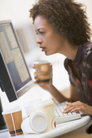 To use this stock image in your creative project, please select the size you need over to the right and click the "Add to Cart" button.
Your downloaded image will come with the Cutcaster watermark removed so don’t worry about the watermark you see on this page. Woman in computer room with many cups of empty coffee around her stock photo, by Monkey Business Images