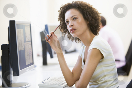 To use this stock image in your creative project, please select the size you need over to the right and click the "Add to Cart" button.
Your downloaded image will come with the Cutcaster watermark removed so don’t worry about the watermark you see on this page. Woman in computer room thinking stock photo, by Monkey Business Images