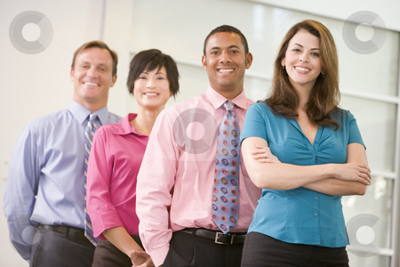 To use this stock image in your creative project, please select the size you need over to the right and click the "Add to Cart" button.
Your downloaded image will come with the Cutcaster watermark removed so don’t worry about the watermark you see on this page. Business team standing indoors smiling stock photo, by Monkey Business Images