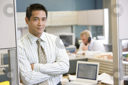 To use this stock image in your creative project, please select the size you need over to the right and click the "Add to Cart" button.
Your downloaded image will come with the Cutcaster watermark removed so don’t worry about the watermark you see on this page. Businessman standing in cubicle stock photo, by Monkey Business Images