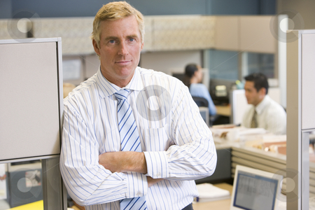 To use this stock image in your creative project, please select the size you need over to the right and click the "Add to Cart" button.
Your downloaded image will come with the Cutcaster watermark removed so don’t worry about the watermark you see on this page. Businessman standing in cubicle stock photo, by Monkey Business Images