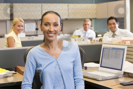 To use this stock image in your creative project, please select the size you need over to the right and click the "Add to Cart" button.
Your downloaded image will come with the Cutcaster watermark removed so don’t worry about the watermark you see on this page. Businesswoman in cubicle smiling stock photo, by Monkey Business Images