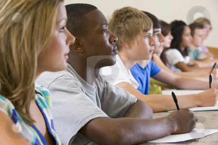 To use this stock image in your creative project, please select the size you need over to the right and click the "Add to Cart" button.
Your downloaded image will come with the Cutcaster watermark removed so don’t worry about the watermark you see on this page. College students listening to a university lecture stock photo, by Monkey Business Images