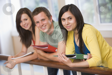 To use this stock image in your creative project, please select the size you need over to the right and click the "Add to Cart" button.
Your downloaded image will come with the Cutcaster watermark removed so don’t worry about the watermark you see on this page. Three college students leaning on banister stock photo, by Monkey Business Images