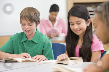 To use this stock image in your creative project, please select the size you need over to the right and click the "Add to Cart" button.
Your downloaded image will come with the Cutcaster watermark removed so don’t worry about the watermark you see on this page. Group of elementary school pupils stock photo, Group of elementary school pupils reading books by Monkey Business Images