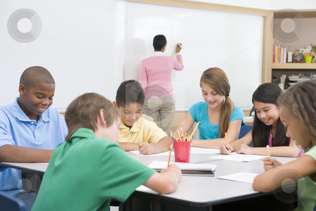 To use this stock image in your creative project, please select the size you need over to the right and click the "Add to Cart" button.
Your downloaded image will come with the Cutcaster watermark removed so don’t worry about the watermark you see on this page. Elementary school clasroom with teacher stock photo, Elementary school clasroom with teacher writing on board by Monkey Business Images