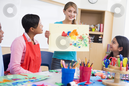 To use this stock image in your creative project, please select the size you need over to the right and click the "Add to Cart" button.
Your downloaded image will come with the Cutcaster watermark removed so don’t worry about the watermark you see on this page. Elementary school pupil in art class stock photo, Elementary school pupil talking about picture in art class by Monkey Business Images