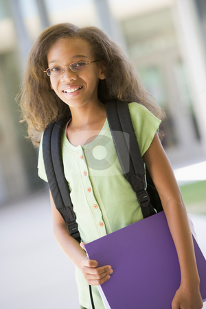 To use this stock image in your creative project, please select the size you need over to the right and click the "Add to Cart" button.
Your downloaded image will come with the Cutcaster watermark removed so don’t worry about the watermark you see on this page. Elementary school pupil outside stock photo, Elementary school pupil outside carrying file by Monkey Business Images