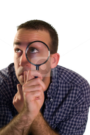 To use this stock image in your creative project, please select the size you need over to the right and click the "Add to Cart" button.
Your downloaded image will come with the Cutcaster watermark removed so don’t worry about the watermark you see on this page. Search And Find stock photo, A young man looking for something with a magnifying glass, isolated against a white background by Richard Nelson