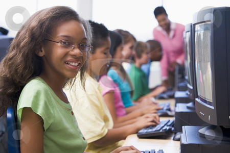 To use this stock image in your creative project, please select the size you need over to the right and click the "Add to Cart" button.
Your downloaded image will come with the Cutcaster watermark removed so don’t worry about the watermark you see on this page. Elementary school computer class stock photo, Female pupil in elementary school computer class by Monkey Business Images