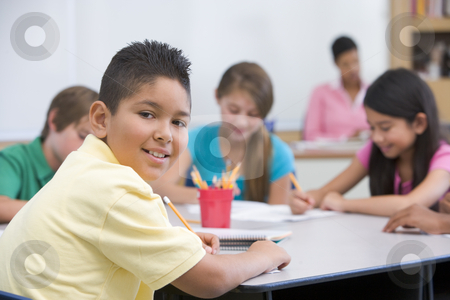 To use this stock image in your creative project, please select the size you need over to the right and click the "Add to Cart" button.
Your downloaded image will come with the Cutcaster watermark removed so don’t worry about the watermark you see on this page. Elementary school pupil in classroom stock photo, Male elementary school pupil in classroom by Monkey Business Images