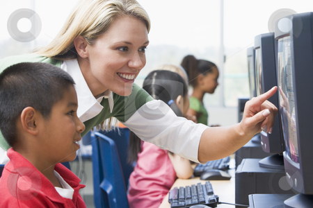 To use this stock image in your creative project, please select the size you need over to the right and click the "Add to Cart" button.
Your downloaded image will come with the Cutcaster watermark removed so don’t worry about the watermark you see on this page. Teacher helping kindergarten children learn how to use computers stock photo, by Monkey Business Images