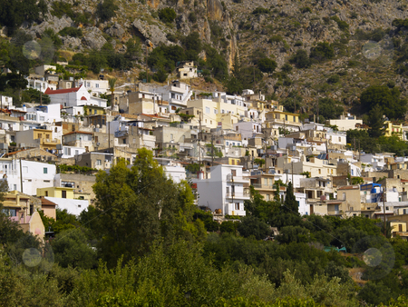 To use this stock image in your creative project, please select the size you need over to the right and click the "Add to Cart" button.
Your downloaded image will come with the Cutcaster watermark removed so don’t worry about the watermark you see on this page. Kritsa stock photo, Little town of Kritsa in cretan mountains by Torsten Lorenz
