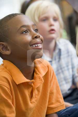 To use this stock image in your creative project, please select the size you need over to the right and click the "Add to Cart" button.
Your downloaded image will come with the Cutcaster watermark removed so don’t worry about the watermark you see on this page. Boys in kindergarten class stock photo, by Monkey Business Images