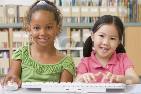 To use this stock image in your creative project, please select the size you need over to the right and click the "Add to Cart" button.
Your downloaded image will come with the Cutcaster watermark removed so don’t worry about the watermark you see on this page. Kindergarten children using computer stock photo, by Monkey Business Images