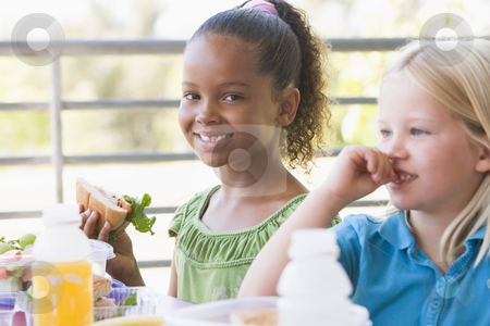 To use this stock image in your creative project, please select the size you need over to the right and click the "Add to Cart" button.
Your downloaded image will come with the Cutcaster watermark removed so don’t worry about the watermark you see on this page. Kindergarten children eating lunch stock photo, by Monkey Business Images