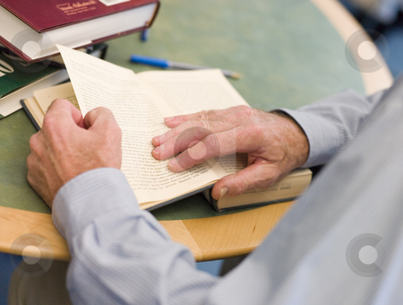 To use this stock image in your creative project, please select the size you need over to the right and click the "Add to Cart" button.
Your downloaded image will come with the Cutcaster watermark removed so don’t worry about the watermark you see on this page. Close-up of mature student's hands turning book page in library stock photo, by Monkey Business Images